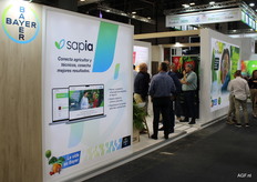 Part of the big Bayer booth where you could 'walk over the heads' as crowded as it was.