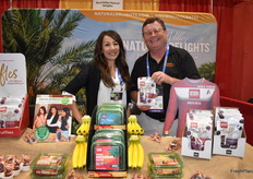 Nancy Roser and Alan Asbury. Alan shows Truffles, a chocolate covered date snack. 