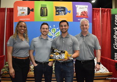 Anneka Jenkins, Kevin Sorichetti, Andrew George, and Dan Martin with EarthFresh. Andrew proudly shows a bag of 24 karat Golden potatoes.