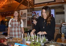 A cooking demo in the Village Farms booth, presented by registered dietitian Kristina La Rue and Helen Aquino with Village Farms.