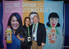 Lucy Sexton and Michael D'Amato are making show attendees happy with samples of Natalie's Orchid Island juice.