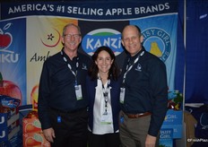 Tim Welsh, Danelle Huber and George Harter with CMI Orchards.