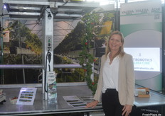 Ruth Giese from Ant Robotics in front of the autonomous crate transporter, which is already being used on many soft fruit farms.