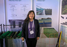 WeiHai Xing Hai Lian produces plastic nets and mats for greenhouse and fruit producing purposes, to manage weeds, wind, sun, bugs. On the photo is Jane Ci.