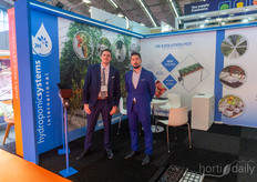 Antonio Garcia and Alberto Espinosa of Hydroponic Systems show their new gutter specially developed for strawberries in pots