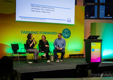 Jen Bromley from Vertical Future, Helen Aquino from Village Farms, and Marc Oshima from Oshima Good Food, engaged in conversation.