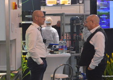 Werner van Mullekom from Agrozone in conversation with fellow exhibitor John van der Hoeven from Milispec.