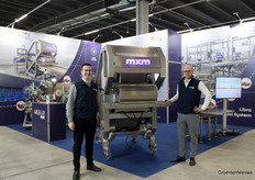 Grzegorz Mironiuk and Michał Domański (Milbor) next to sorting machine MXM for blueberries.