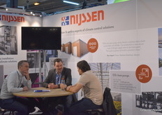 Busy talking at the Nijssen stand