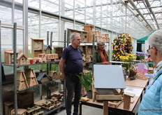 A stall with wooden things, from birdhouse to insect hotel