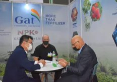 Business talk at the booth of GAT Fertilizers.