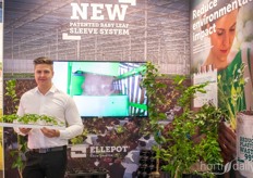 Simon Madsob Jensen with Ellepot holding the company's newest hydroponic sleeve system