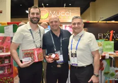 Stephen Cowan, Steve Zaccardi, and Joe Spano with Mucci Farms. Stephen shows the latest product introduction, strawberry tomatoes. 