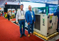 Tal Netzer and Doug Miller show the Drygair machine at the AdeptAg booth