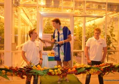 Two students, both sons of cucumber growers, opened the greenhouse.