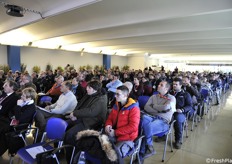 The conference room is packed