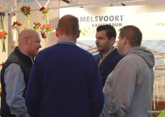 Sven Fitters in conversation at the Van Amelsvoort Kassenbouw booth.