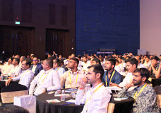 Delegates enjoy the speaker’s humorous take on field experiences.