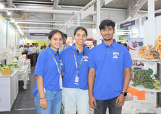 Horticulture students lend a hand at the Karnataka Pavillion.