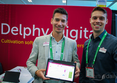 Max van den Hemel and Joost Scholten with Delphy. Max is showing the Delphi QMS data-driven cultivation software
