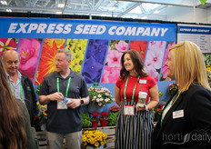Mike Chow and Kris Rittenour, Express Seed Company, talking to visitors