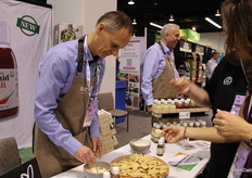 Soren Hansen, Northern Greens from Denmark, making a taster, for a visitor. Fresh Herbs for a botlle