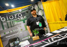 The coolest thing about this photo is not that Nevada King has the ultimate Vegas-name, but the machine on his desk: the Happy Quality Stomato Scope, to scan the status of stomata