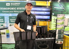 Mads Jensen with the Blackmore company. Showing the AirTray for strawberries