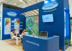 Meetings at Normist's booth.
