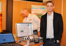Dominik Bretz from RAM next to the greenhouse climate computer simulation training module.