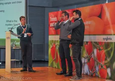 Two attendees doing a taste experiment during a presentation on flavour by Syngenta's Daniel Ricket.