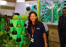 Dessy Lim, Marketing Manager of Thai Advance, Agri Tech Co., LTD. promoting the vertical hydroponic growing systems.