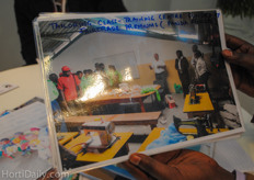 Joram Kanyua from Panda Flowers Limited showing their fair trade projects.