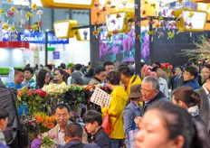 The booth of FlowerForce was crowded at any time.