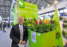 William Wang of EP Exotic Plant in Shanghai standing next to some wonderful Bromelias.