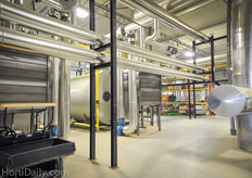 This is the heart of Truly Green; the boiler room, where the connection with Greenfields enters. Right now there are also two natural gas boilers, but as we speak, an additional two boilers are installed.