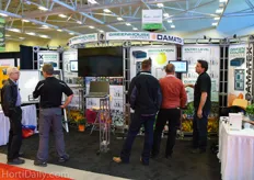 Wayne Sicard (right) welcoming some growers at the booth of Damatex.