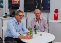 Sjaak Bakker from Flier Systems and agricultural counselor Jean Rummenie, with a Dutch drink in the Holland pavilion