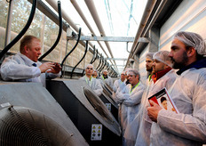 Ron Threels is taking care of the second group visiting the greenhouse.