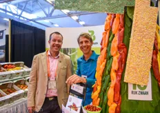 Duffy Kniaziew of Orangeline Farms together with John DeVries of Rijk Zwaan Canada.