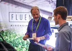 Andy Kuyvenhoven of Flowers Canada visiting the booth of Fluence Bioengineering.