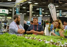 ​ Cropking’s Paul Brentlinger talks hydroponics with visitors.