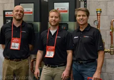​ The heat is on in the new boiler room booth of BioTherm; from l to r: Dan, Joel and Mike.