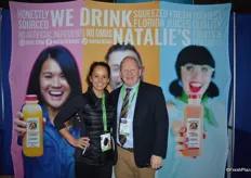 Lucy Sexton and Michael D'Amato are making show attendees happy with samples of Natalie's Orchid Island juice.