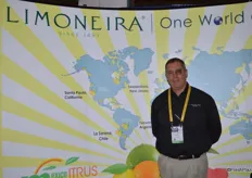 John Caragliano with Limoneira stands in front of the world map that shows Limoneira's citrus growing locations. The company's lime program starts in January.