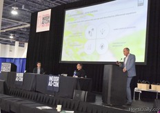 On stage two Darryn Keiller, CEO of Autogrow, John Proven, COO of Afrgus Control Systems and Jan Westra, Strategic Business Developer with Priva (speaking) discuss AI and machine learning and the impact on the industry.