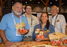 Jose Marrero, James Webster, Debbie Letourneau and Michael Ryshouwer with Flavorful Brands show Tasti-Lee tomatoes.