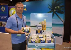 William Ison with Earth Source Trading proudly shows Corona-branded limes. The Corona bin stackers are now available in the beer and liquor areas of grocery stores in the US.