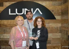Peggy Hutson, Shane Lewis and Linzy Witherspoon with Luna. The company won the award for Best New Indoor Growing Technology with IUNU.
