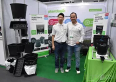 "Jonathan Camarena & Mike Sun with Plantlogic, showing their pots helping growers save water and fertilizer. "That means saving money."